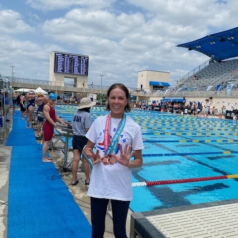 In front of the competition pool at Nationals April 2025